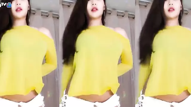 Beautiful Korean girl dancing in front of webcam